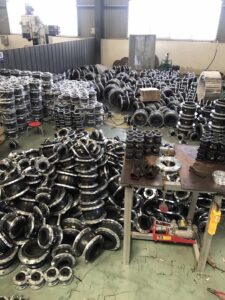 Rubber expansion joints stacked in warehouse of Zhengzhou Hongze Valve & Pipeline Equipment Co., Ltd.